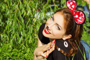 beautiful girl happy smiling in the costume of a mouse